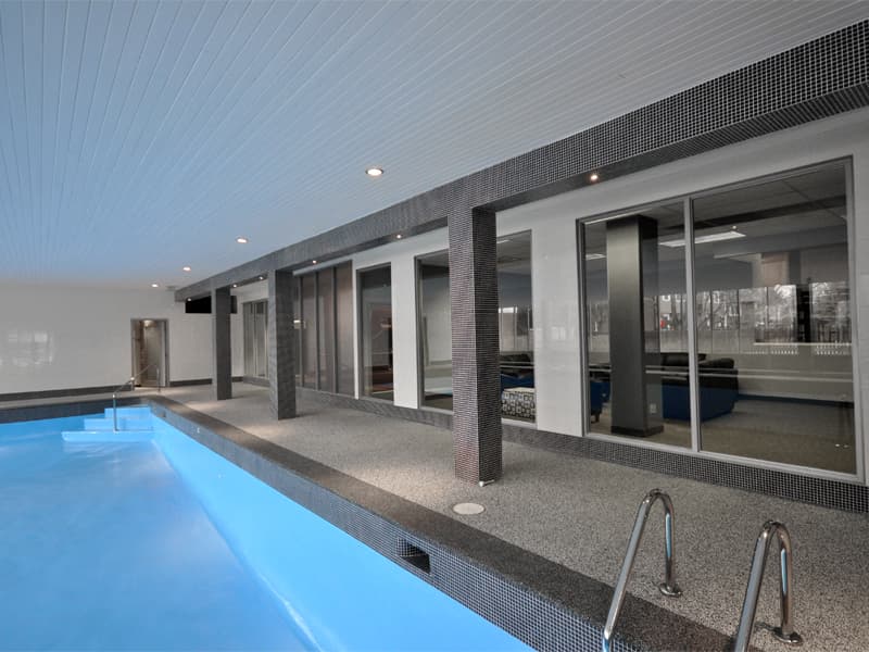 Softroc rubber surfacing around a pool